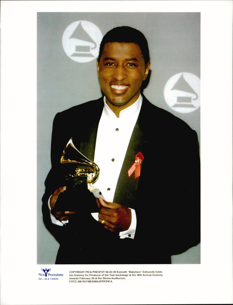 Music producer Kenneth Babyface Edmonds with his grammy - Vintage Photograph