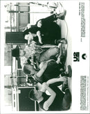 The members of the group are from Mulan Jr, Adam Clayton, The Edge and Bono. - Vintage Photograph