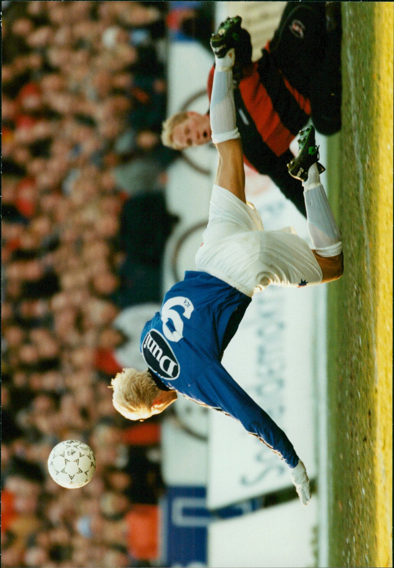 Football players in action during the final between Halmstad BK and Ljungskile in soccer SM in 1997 - Vintage Photograph