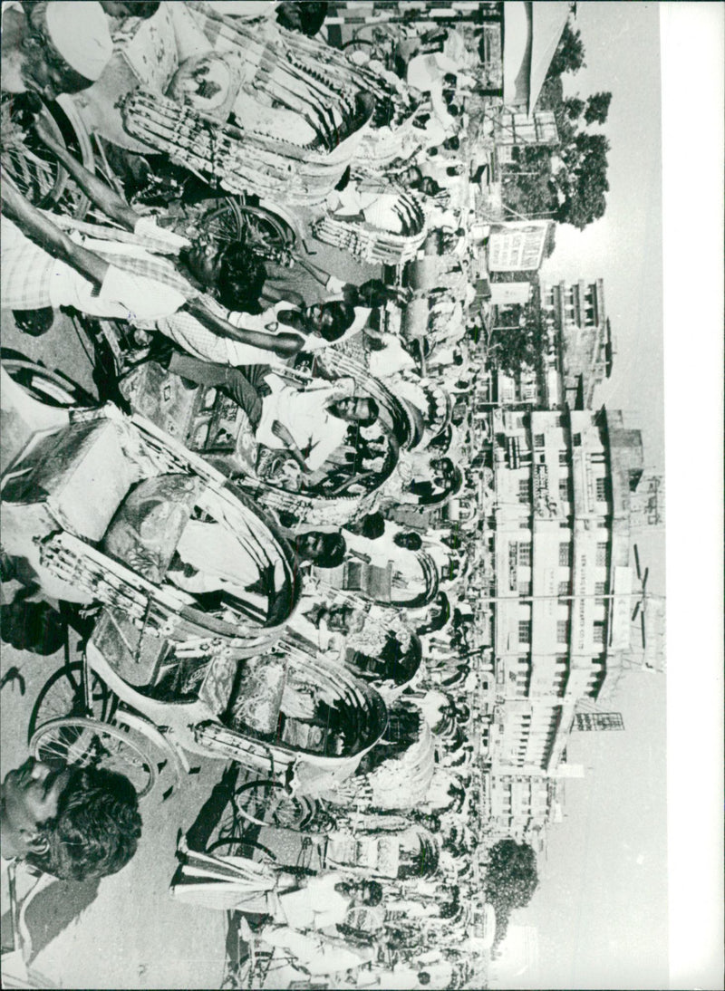 There are thousands of bike rickshaws in Dhaka. This picture is taken in Jinnah Avenue - Vintage Photograph