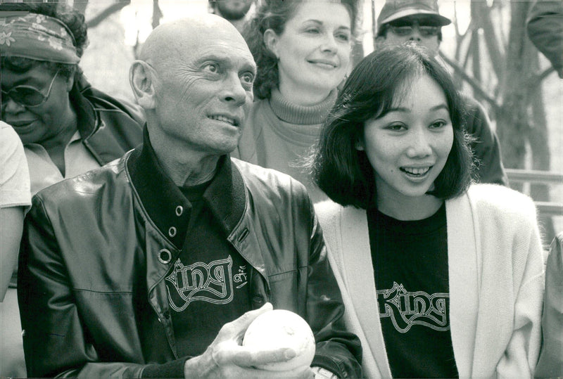 Yul Brynner with his wife Kathy Lee on a soft-ball match in Central Park - Vintage Photograph