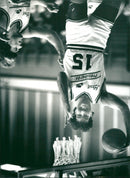 Sam Foggin dumps basketball in the net during a match - Vintage Photograph