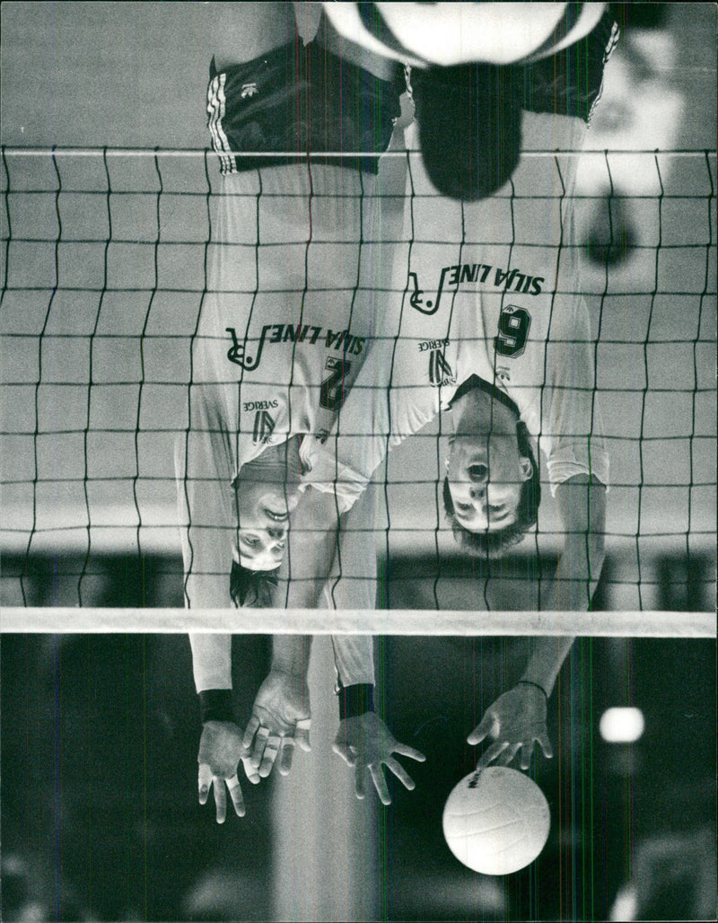 Volley-ball. Swedish national team in the match against Hungary. Here is the Swedish block in the form of HÃ¥kan BjÃ¶rne and Urban Lennartsson - Vintage Photograph