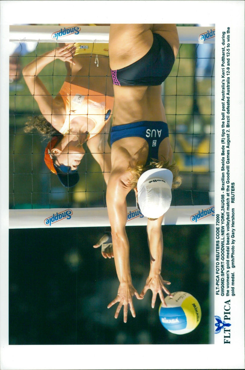 Shelda Bed (Brazil) in action against Kerri Pottharst (Australia) during the Women&