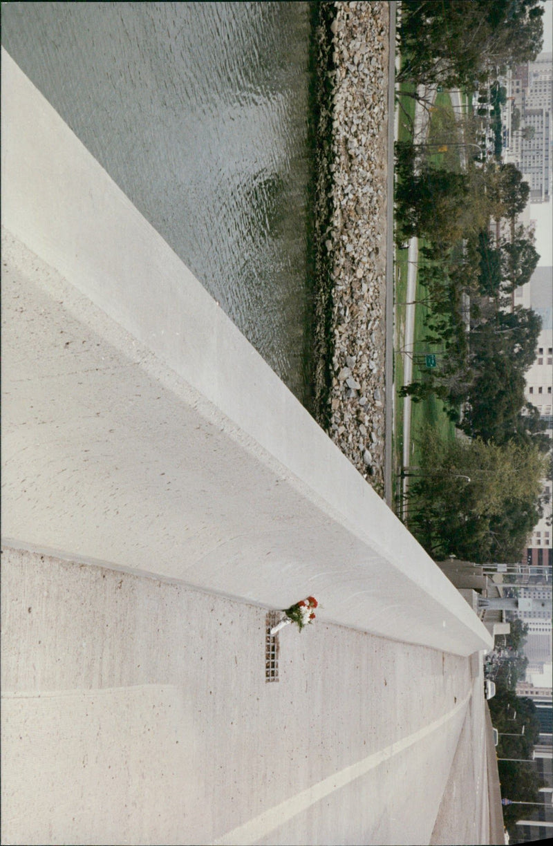 Flower bouquet on the bridge where two children were murdered - Vintage Photograph