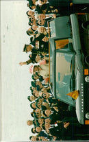 Queen Elizabeth with war veterans during the 50th anniversary of the British landing on Gold beach. - Vintage Photograph