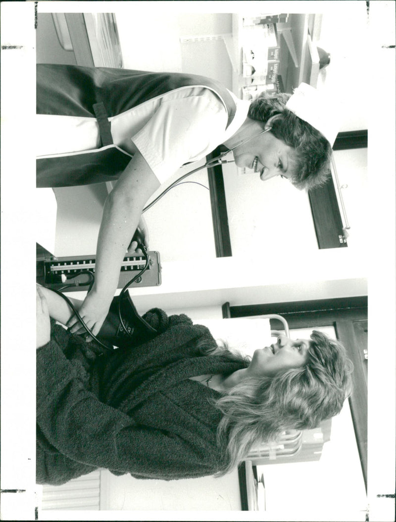 Blood pressure test at a BUPA hospital. - Vintage Photograph