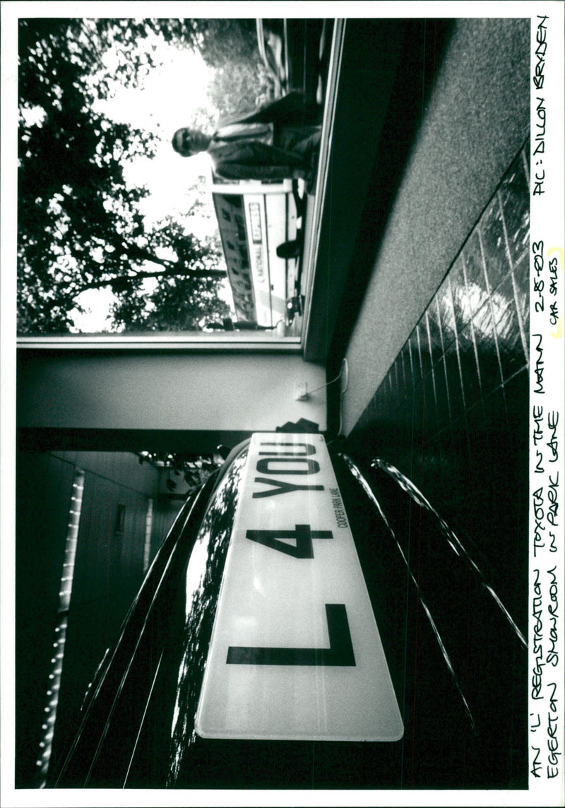 An "L" registration Toyota in the Mann Egerton showroom in Park Lane. - Vintage Photograph