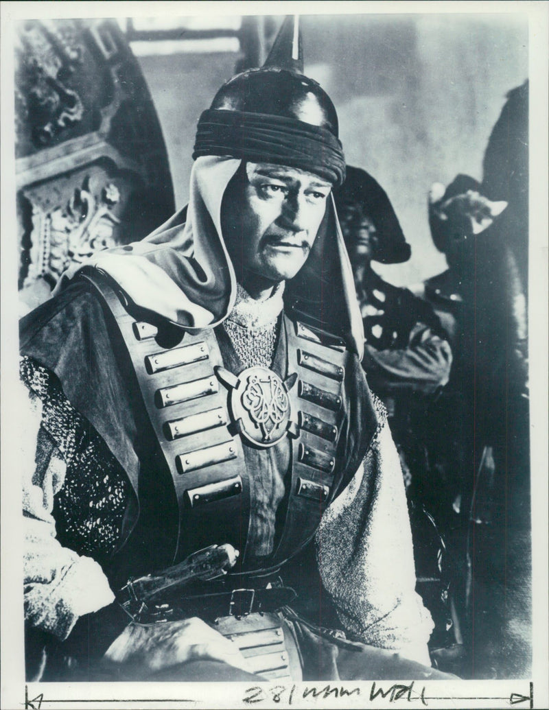 American actor John Wayne as a soldier in a scene of film - Vintage Photograph