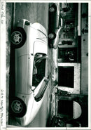 A Lotus Elan parked on the road - Vintage Photograph