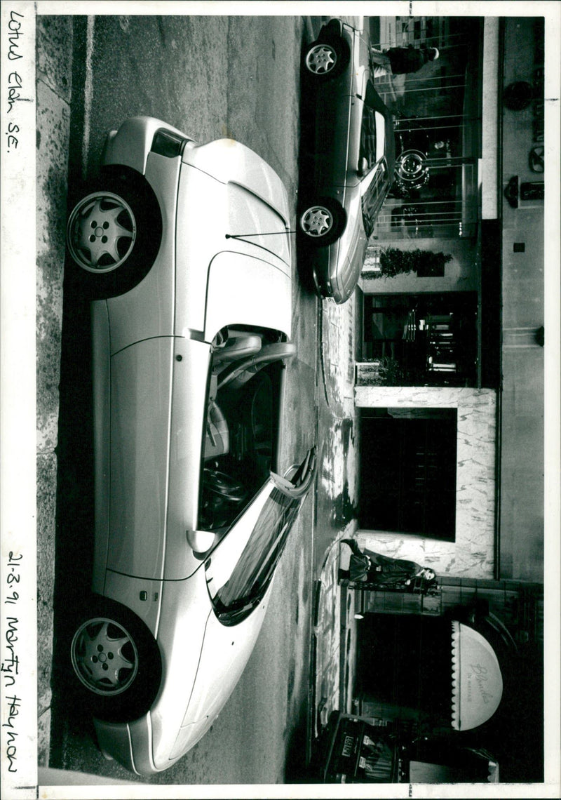 A Lotus Elan parked on the road - Vintage Photograph