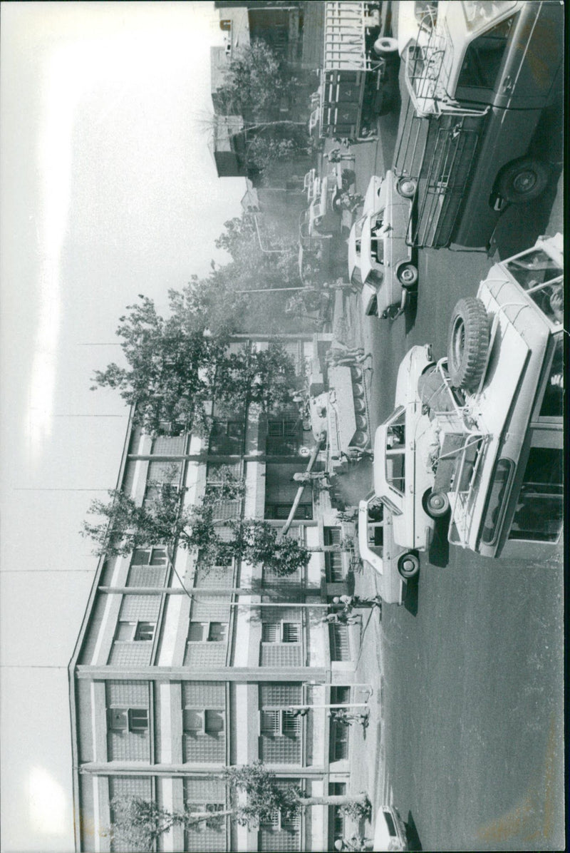 Tanks are guarded at a government building - Vintage Photograph