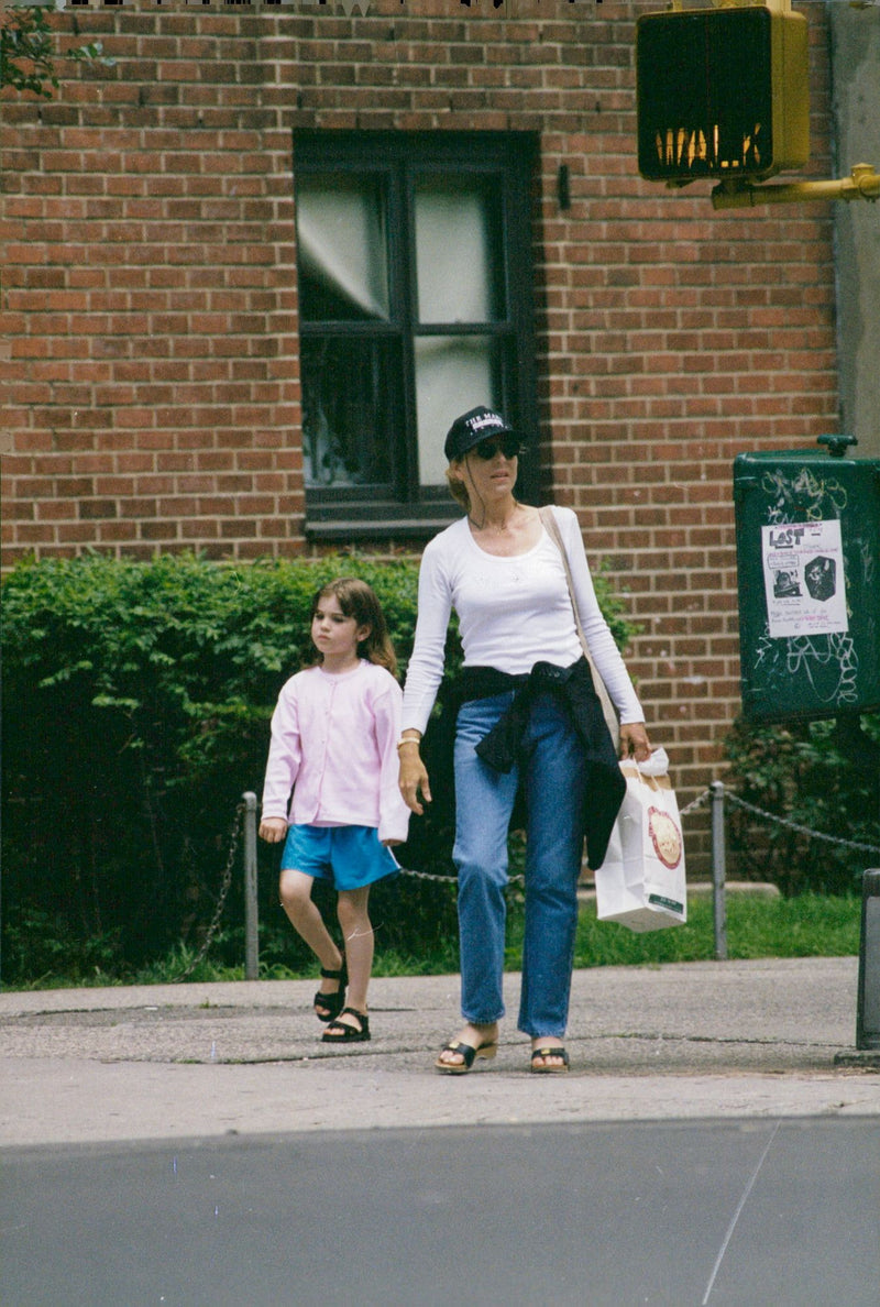 Tatum O'Neal and daughter Emily walk on the Columbus avenue - Vintage Photograph