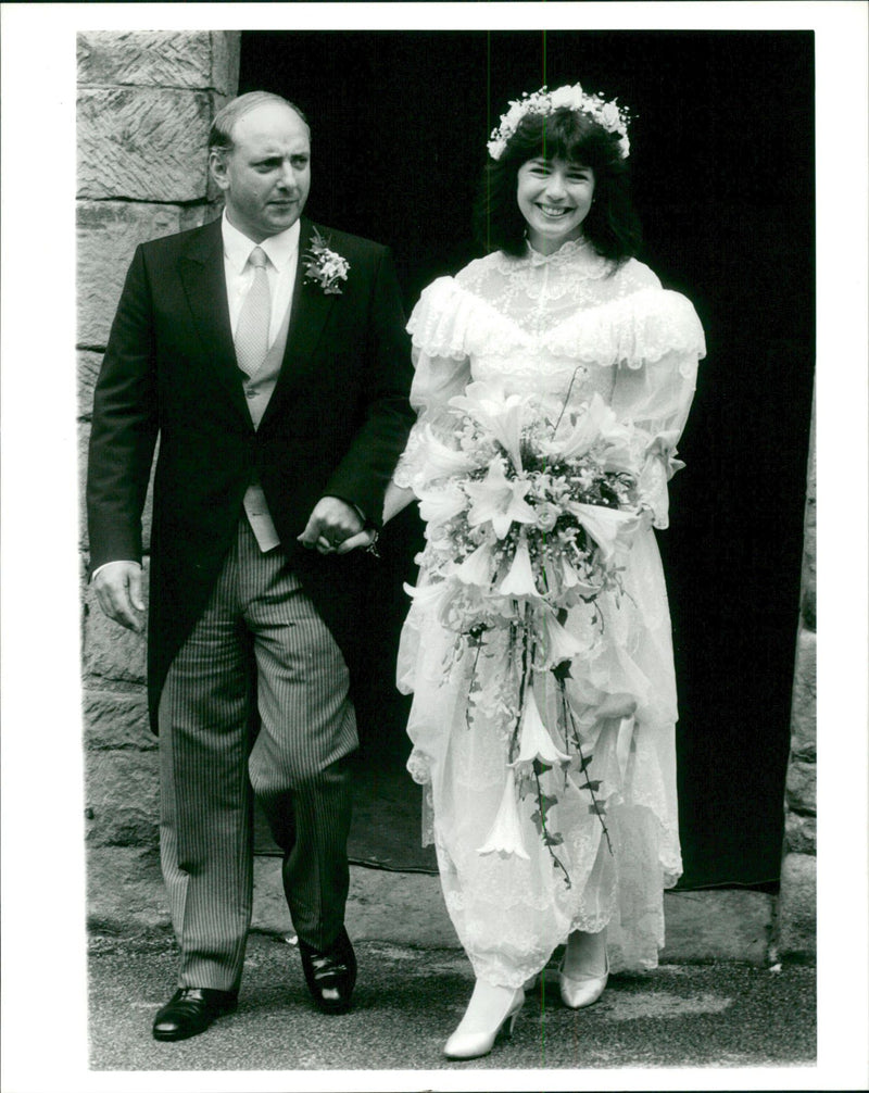 Kathy Rochford pictured with her husband on their wedding day in Derby - Vintage Photograph