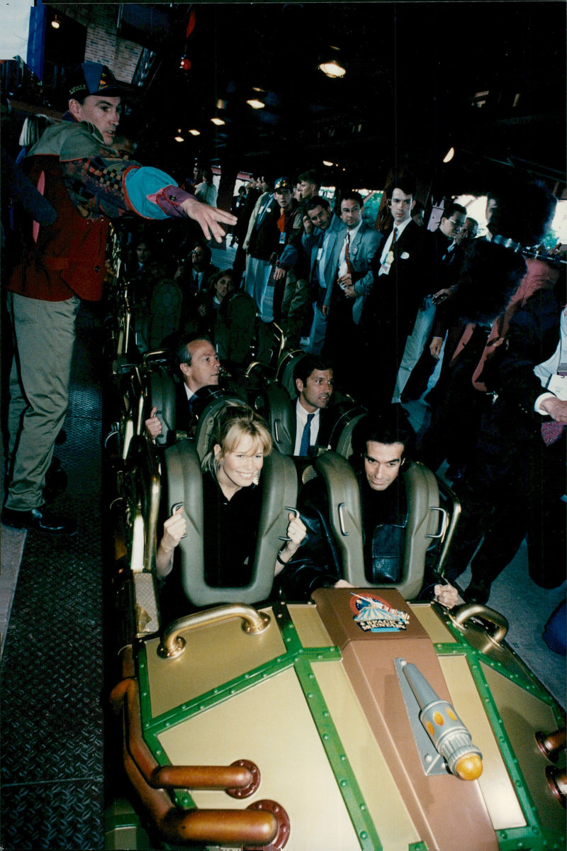 Claudia Schiffer and David Copperfield at the inauguration of the Space Mountain thrill ride in Disneyland near Paris - Vintage Photograph