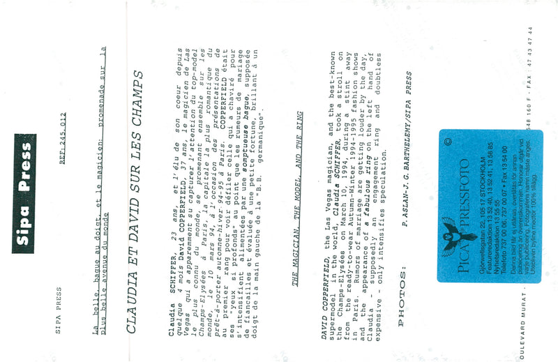 A close-up of Claudia Schiffer showing her engagement ring. She is engaged to David Copperfield - Vintage Photograph