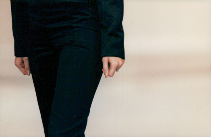 A close-up of Claudia Schiffer showing her engagement ring. She is engaged to David Copperfield - Vintage Photograph