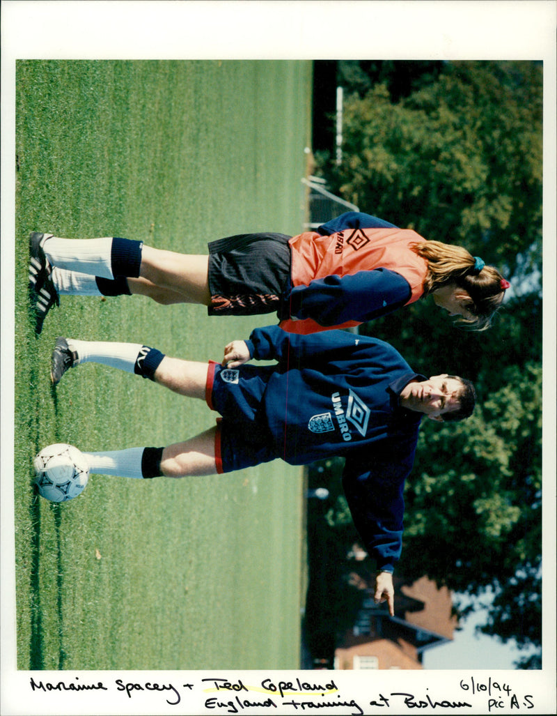 Debbie Bampton and Ted Copeland playing football. - Vintage Photograph