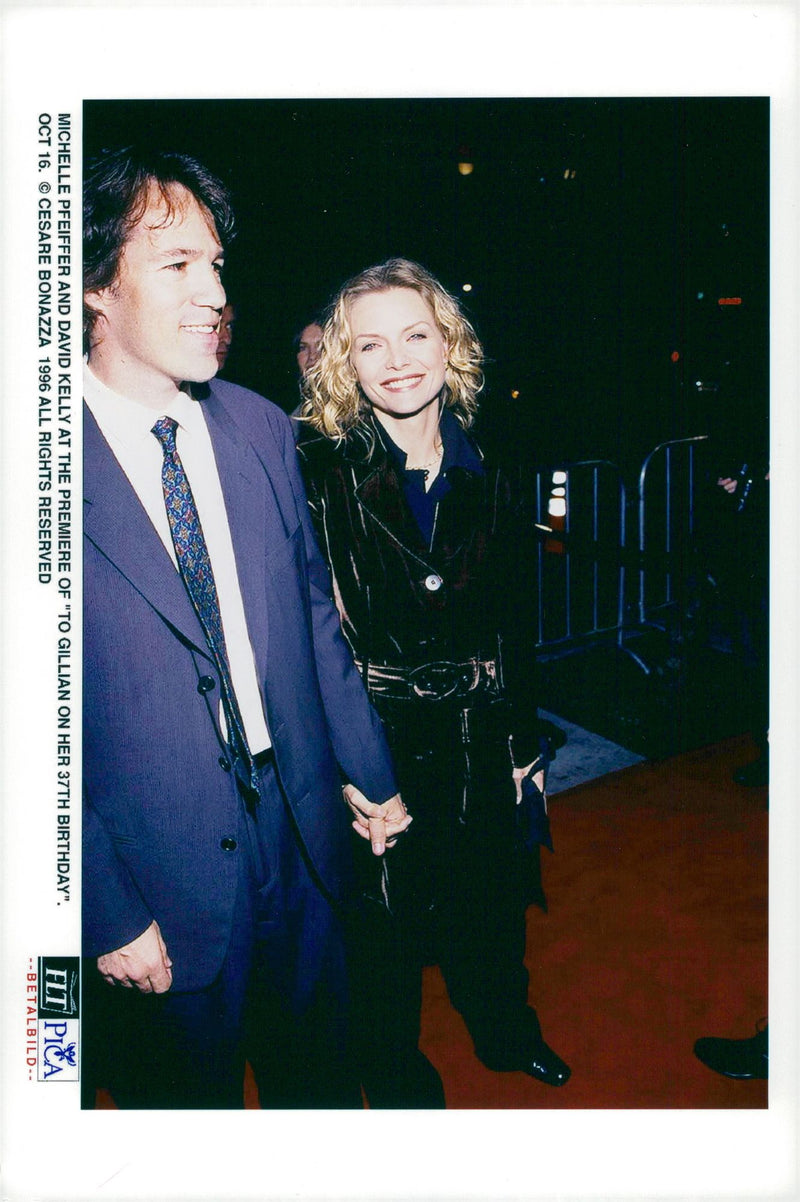 Scriptwriter David E. Kelley with his wife Michelle Pfeiffer at the premiere of &quot;Till Gillian on her 37th birthday&quot; - Vintage Photograph