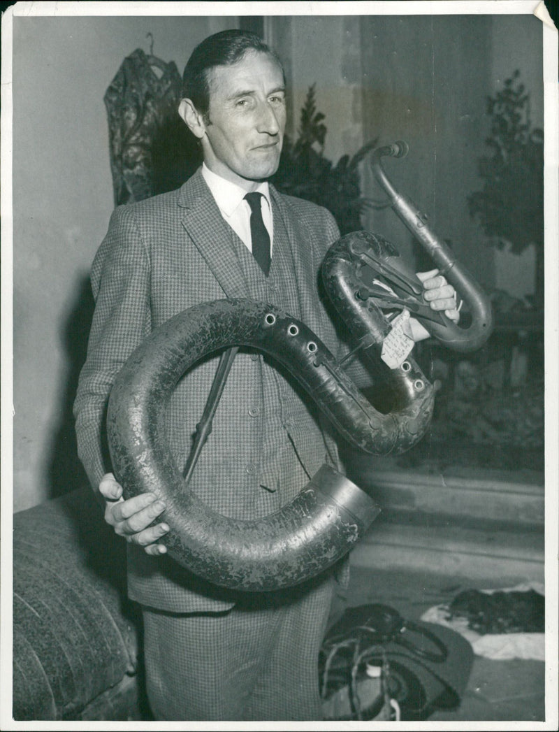 Man with his musical instrument. - Vintage Photograph