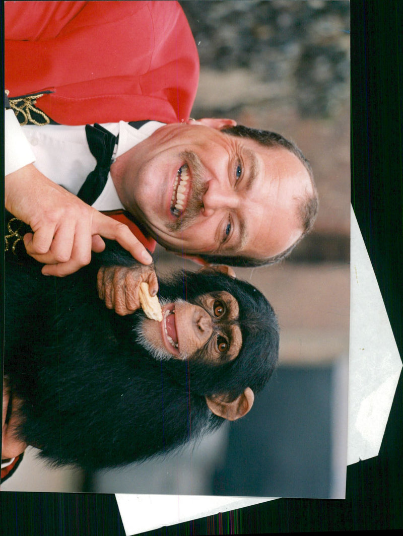 Circus Animal, monkey eating cookie - Vintage Photograph