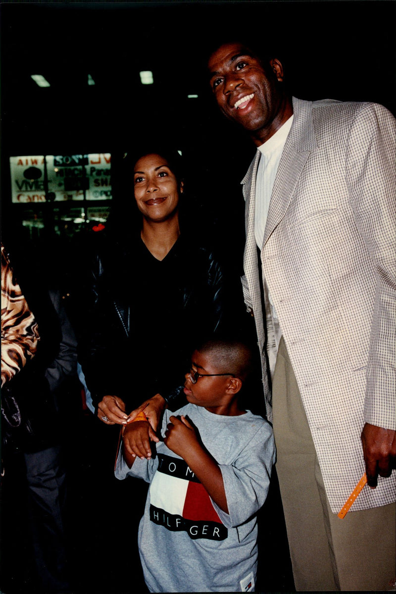 The bass player Earvin &quot;Magic&quot; Johnson with his family - Vintage Photograph