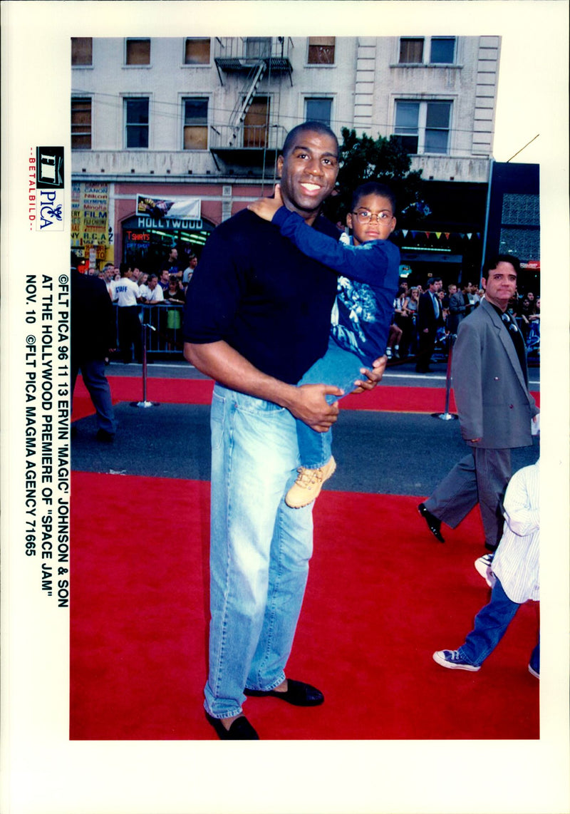 The bass player Earvin &quot;Magic&quot; Johnson with his son - Vintage Photograph