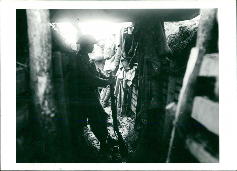 A British soldier standing in front line trench during Battle of Messines in 1917 - Vintage Photograph