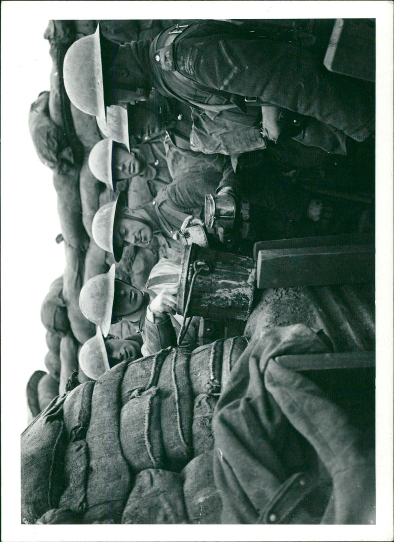 British soldiers inspecting something during The Battle of Messines in 1917 - Vintage Photograph