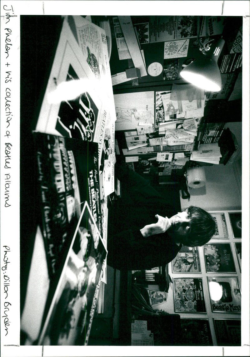 Jim Phelan and his collection of Beatles albums. - Vintage Photograph