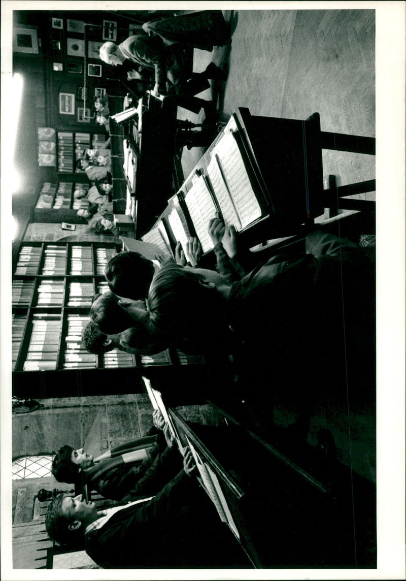 Children studying music in the room. - Vintage Photograph