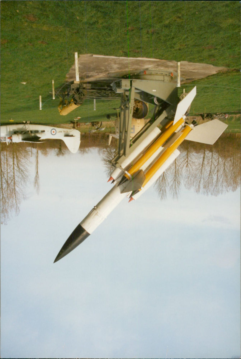 View of jet plane in the field. - Vintage Photograph