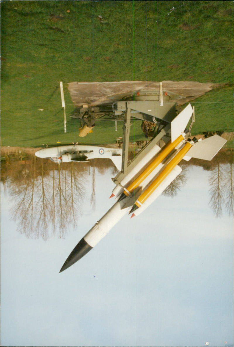 View of Jet plane in the field. - Vintage Photograph