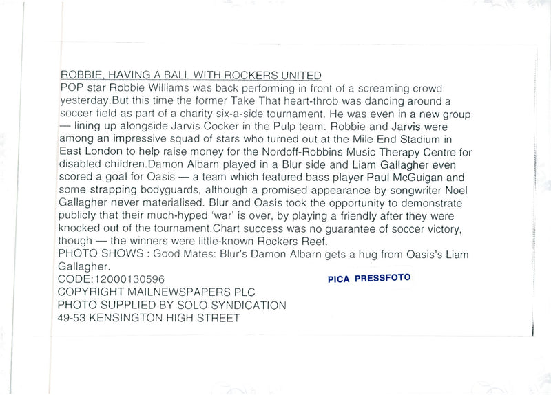 Damon Albarn gets a hug by Liam Gallagher - Vintage Photograph