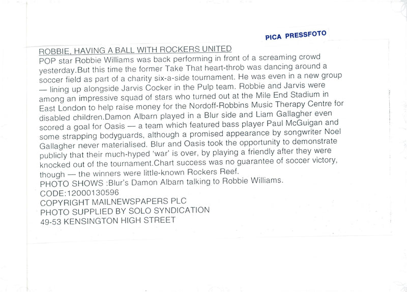 Damon Albarn in conversation with Robbie Williams - Vintage Photograph