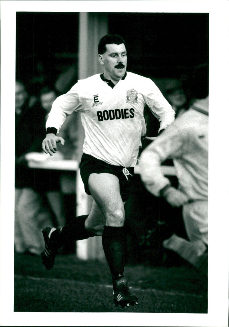 Chris Camden is running. - Vintage Photograph