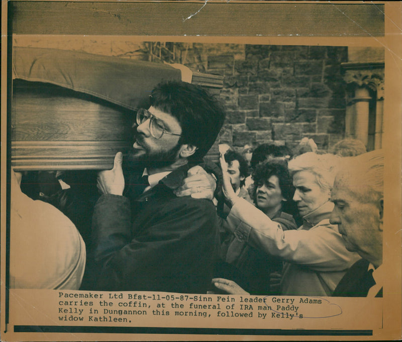 Sinn Fein leader Gerry Adams carries the coffin, at the funeral of IRA man Paddy Kelly - Vintage Photograph