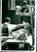 a man he heals the lion. - Vintage Photograph