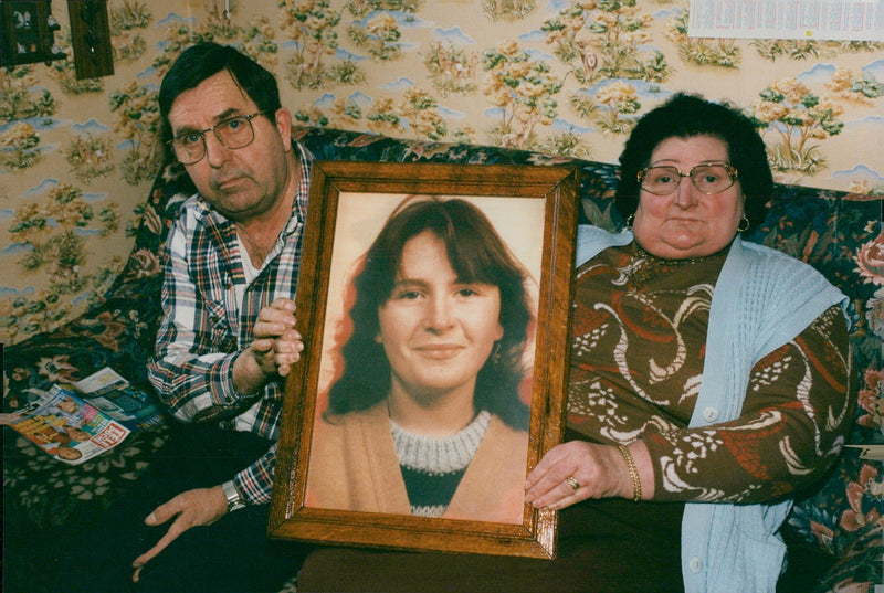 France: Case law / Murder. Louise and Gilbert Dassonville with a photograph of their daughter Anite Dassonville littered by Jean Michel Jourdain - Vintage Photograph