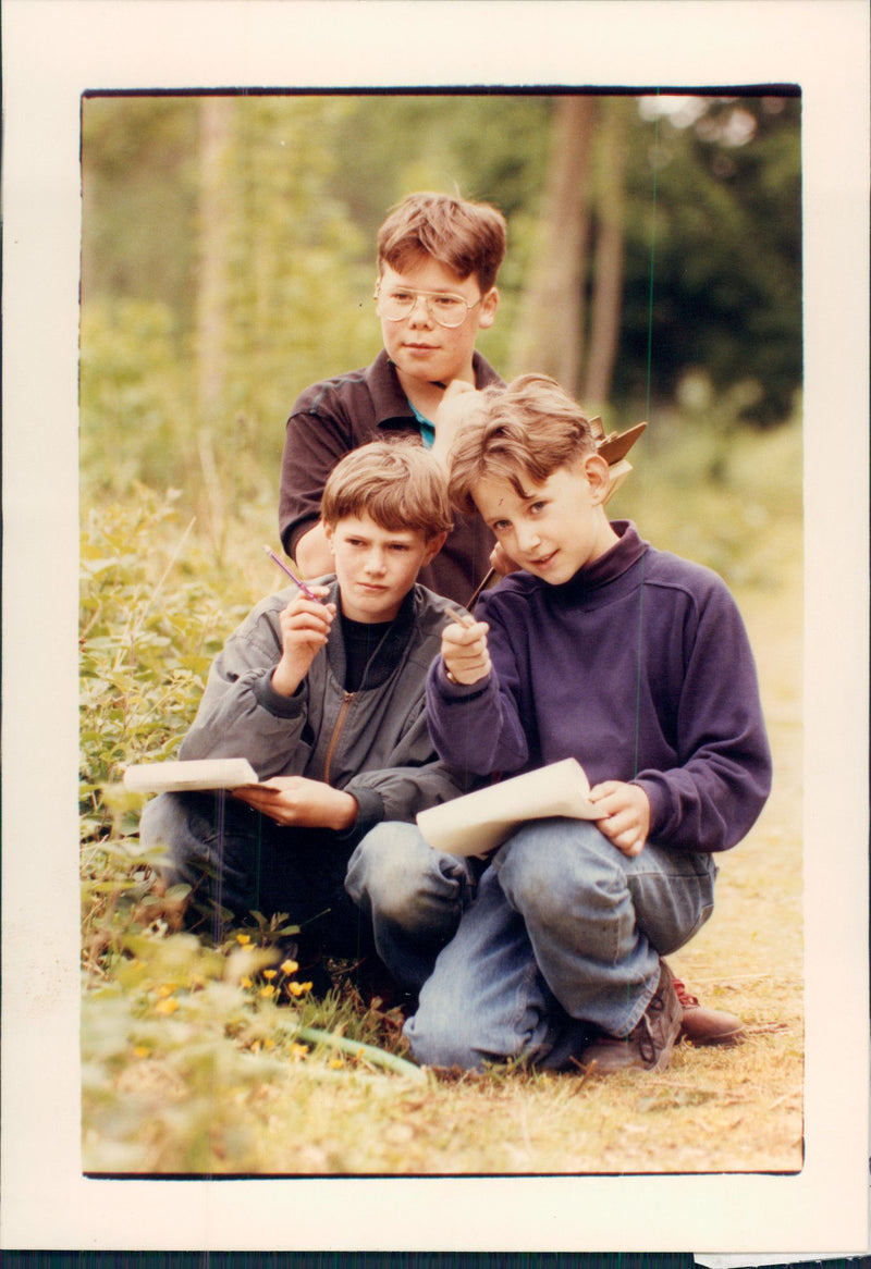 Conversation environment:mulbarton middle school pupils identifying species in lower wood nature. - Vintage Photograph