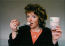 Writer Jo Malone tucks into some Cappuccino ice cream - Vintage Photograph