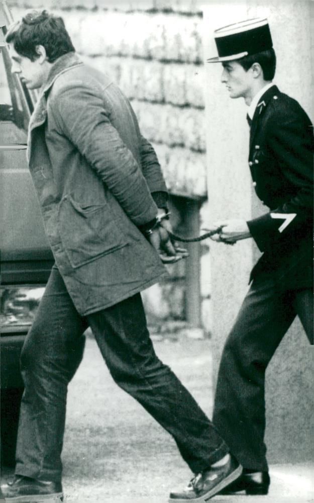 The suspected murderer David Evans is taken away by police - Vintage Photograph