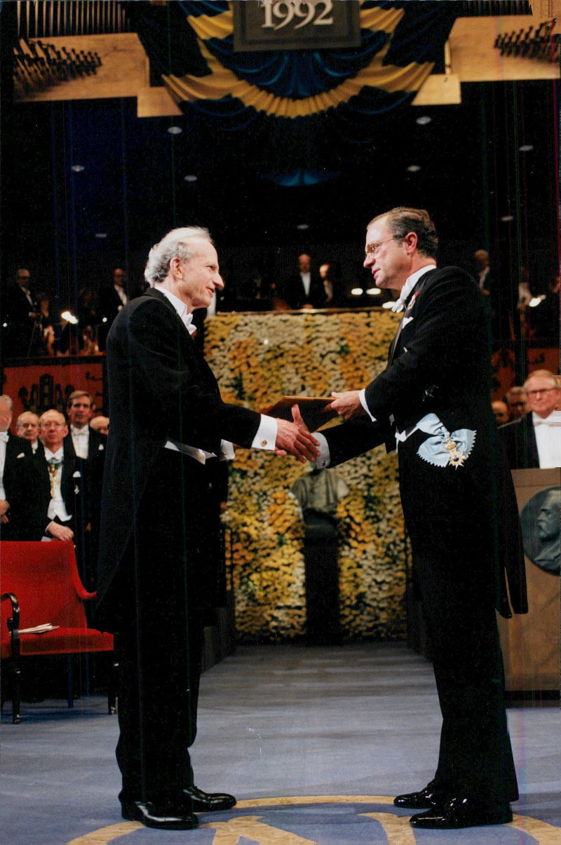 Gary Becker receives the Nobel Prize by King Carl XVI Gustaf in the Concert Hall - Vintage Photograph