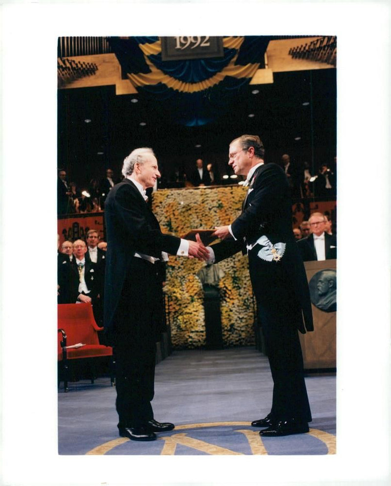 Gary Becker receives the Nobel Prize by King Carl XVI Gustaf in the Concert Hall - Vintage Photograph