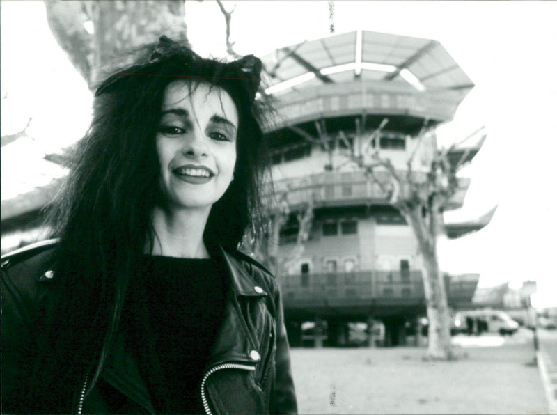 French new-wave architect, Odile Decq outside an example of new council housing in Nimes. - Vintage Photograph